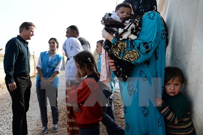 Великобритания приняла первых беженцев из Сирии  - ảnh 1